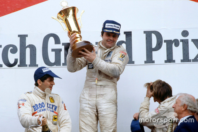 Подіум: переможець гонки Алан Джонс, Williams, друге місце Jody Scheckter, Ferrari, третє місце Jacq
