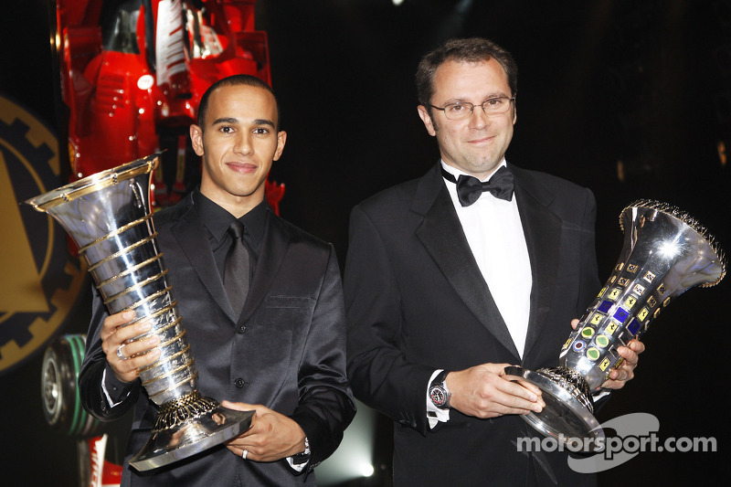 2008 FIA Formula 1 World champion Lewis Hamilton, and winning constructor Ferrari Team director Stefano Domenicali