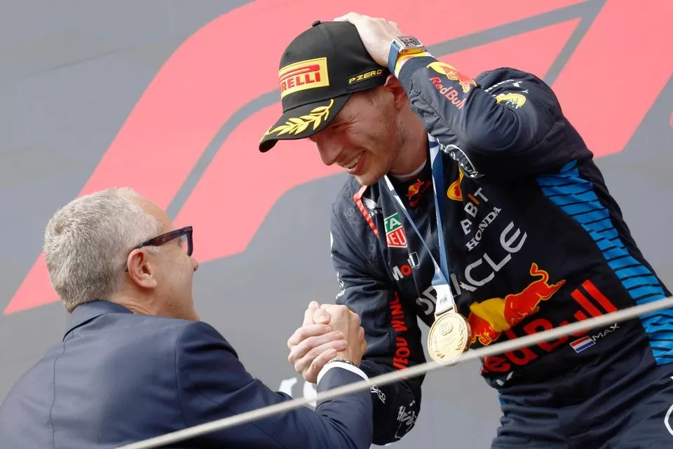 Max Verstappen, Red Bull Racing, 1st position, receives his FIA winners medal from Stefano Domenicali, CEO, Formula One Group