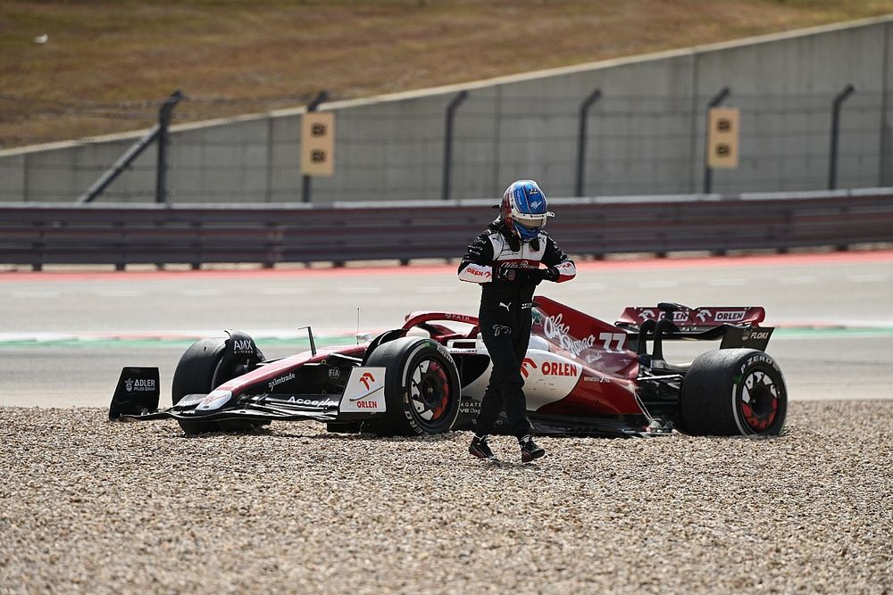 Valtteri Bottas, Alfa Romeo C42, walks away from his beached car after spinning into the gravel