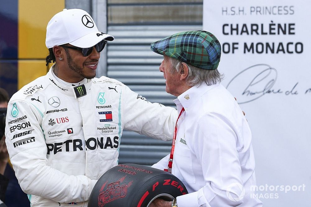 Lewis Hamilton, Mercedes AMG F1, celebrates pole position, and is presented with the Pirelli Pole Trophy by Jackie Stewart