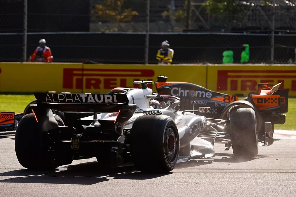 Oscar Piastri, McLaren MCL60, Yuki Tsunoda, AlphaTauri AT04, collide as they battle for position