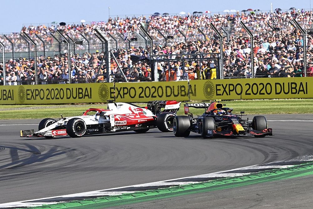 Kimi Raikkonen, Alfa Romeo Racing C41, spins after contact with Sergio Perez, Red Bull Racing RB16B

