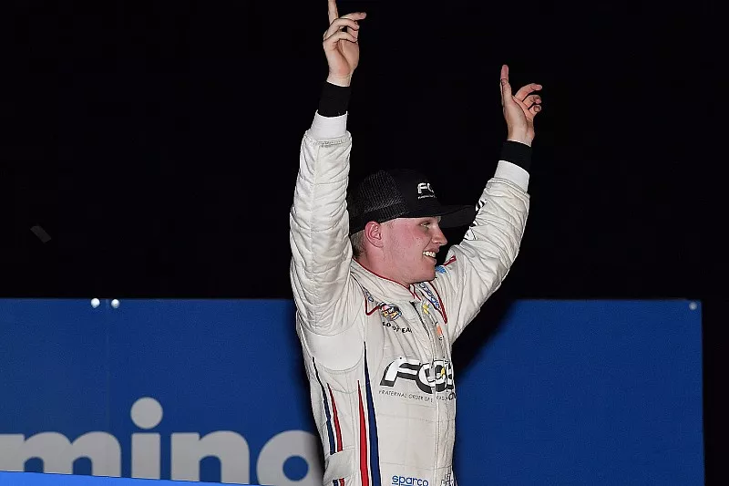 Justin Haley, GMS Racing, Chevrolet Silverado Fraternal Order Of Eagles celebrates his win 