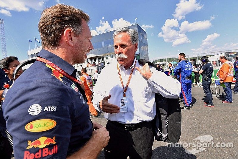 Christian Horner, Red Bull Racing Team Principal and Chase Carey, Chief Executive Officer and Executive Chairman of the Formula One Group on the grid