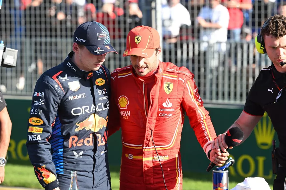 Pole man Max Verstappen, Red Bull Racing, and Carlos Sainz, Scuderia Ferrari, in Parc Ferme