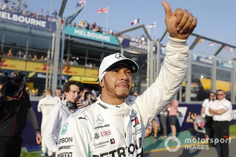 Pole Sitter celebrates Lewis Hamilton, Mercedes AMG F1 in Parc Ferme


