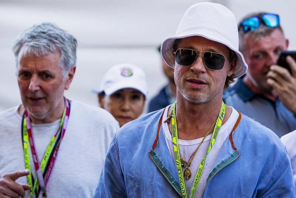 Actor Brad Pitt visits the Paddock