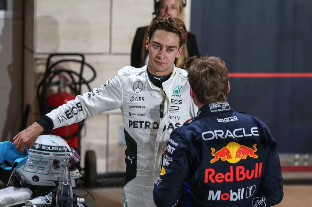 Pole man Max Verstappen, Red Bull Racing, and George Russell, Mercedes-AMG F1 Team, talk in Parc Ferme