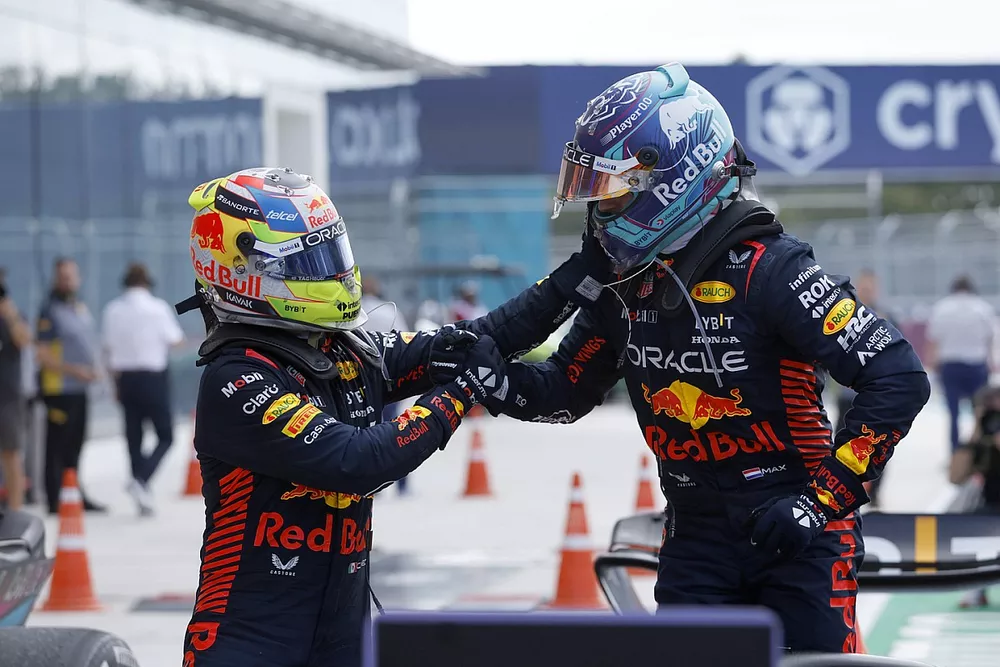 Sergio Perez, Red Bull Racing, 2nd position, Max Verstappen, Red Bull Racing, 1st position, congratulate each other on arrival in Parc Ferme