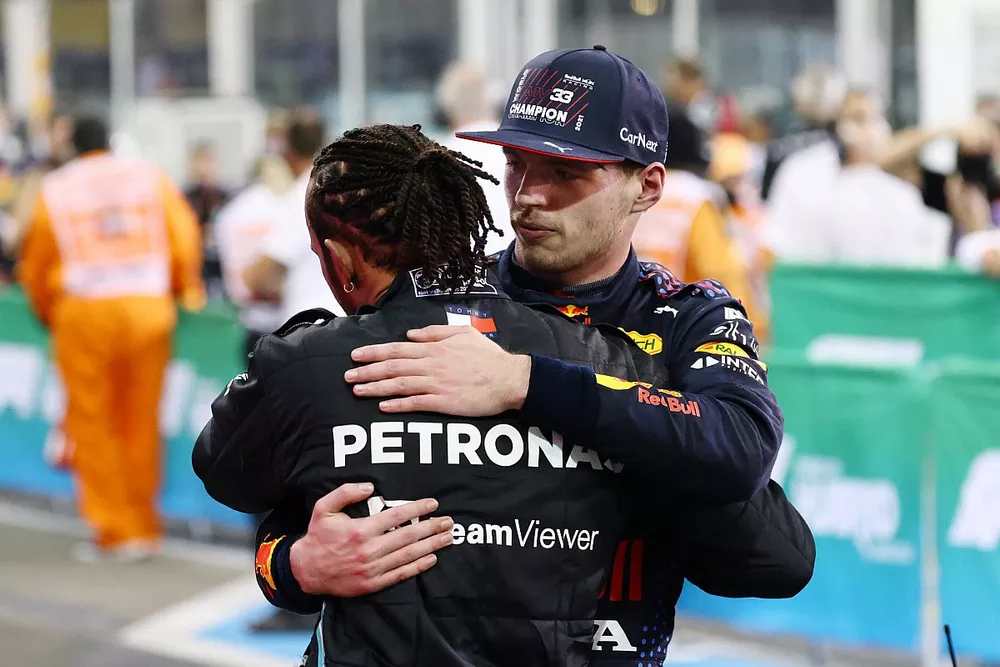 Lewis Hamilton, Mercedes, 2nd position, congratulates Max Verstappen, Red Bull Racing, 1st position, in Parc Ferme