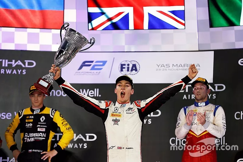 George Russell, ART Grand Prix celebrates on the podium with Artem Markelov, RUSSIAN TIME, and Luca Ghiotto, Campos Racing