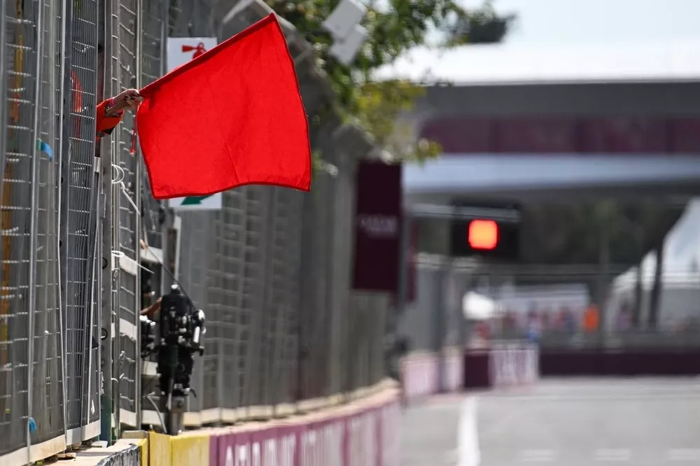 Marshals wave the red flag 