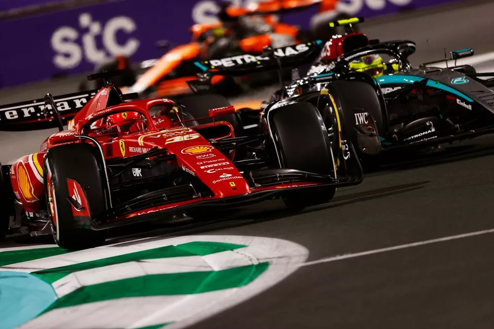 Charles Leclerc, Ferrari SF-24, battles with Lewis Hamilton, Mercedes F1 W15