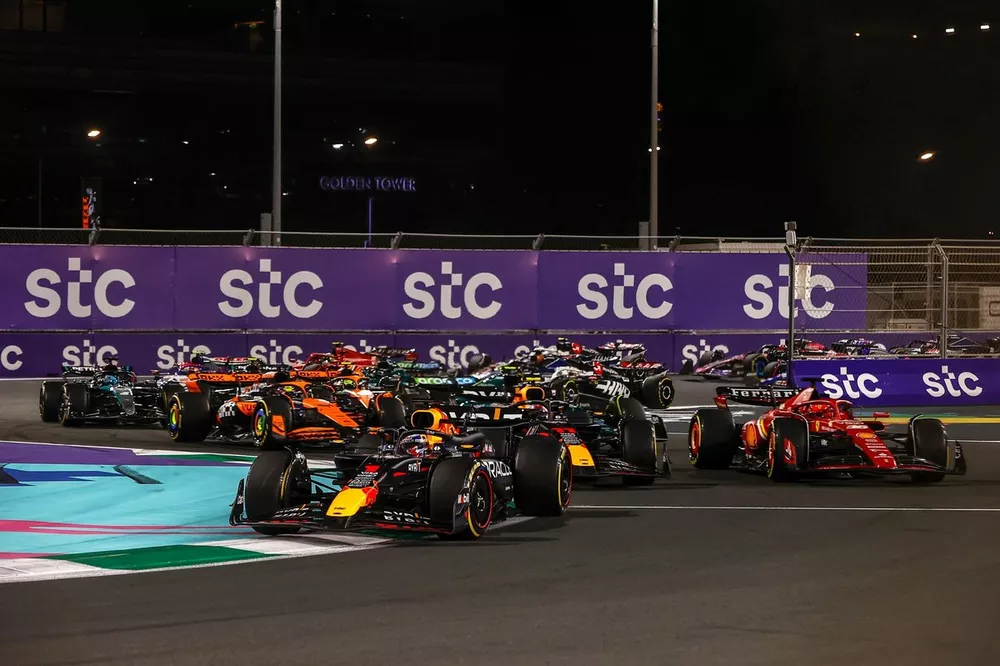 Max Verstappen, Red Bull Racing RB20, leads Charles Leclerc, Ferrari SF-24, Sergio Perez, Red Bull Racing RB20, Oscar Piastri, McLaren MCL38, and the rest of the field at the start