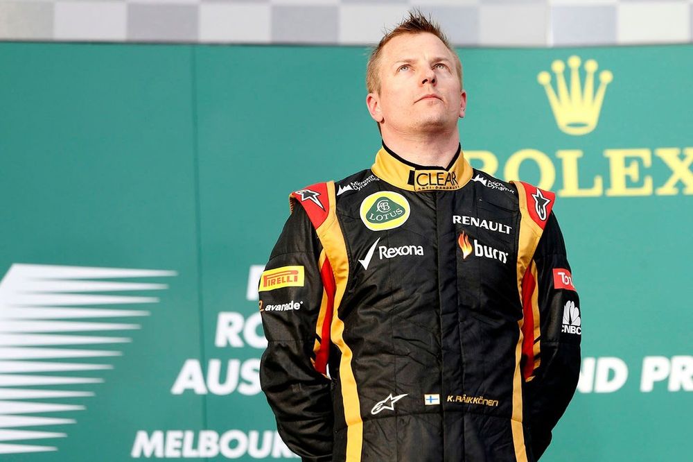 Podio: ganador de la carrera Kimi Raikkonen, Lotus 