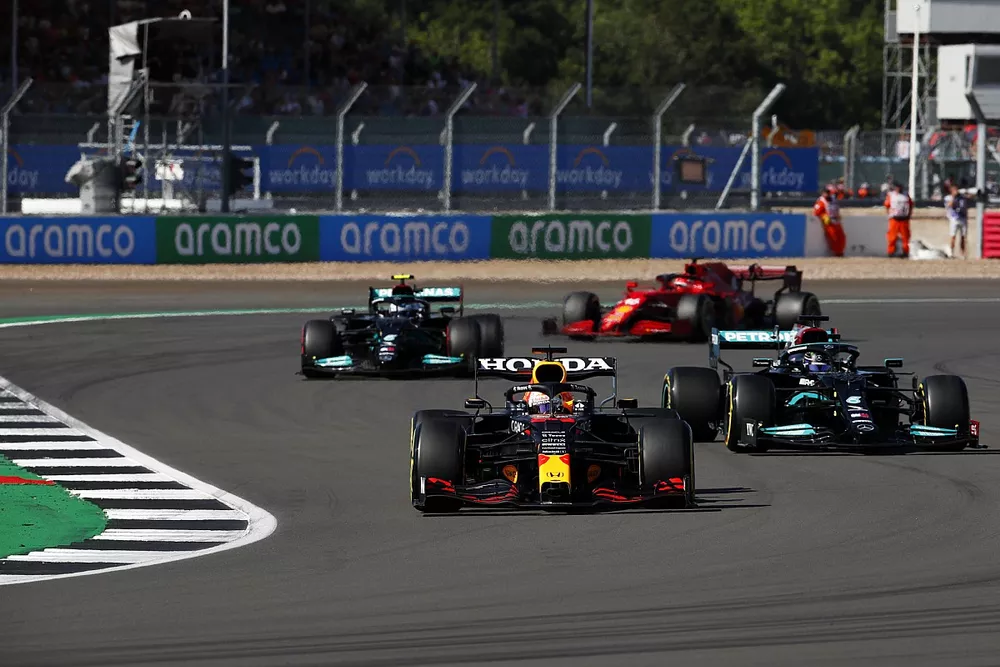 Max Verstappen, Red Bull Racing RB16B, Lewis Hamilton, Mercedes W12, Valtteri Bottas, Mercedes W12, and Charles Leclerc, Ferrari SF21