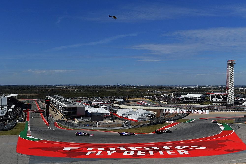 Antonio Giovinazzi, Alfa Romeo Racing C38, leads Lance Stroll, Racing Point RP19, and Sergio Perez, Racing Point RP19