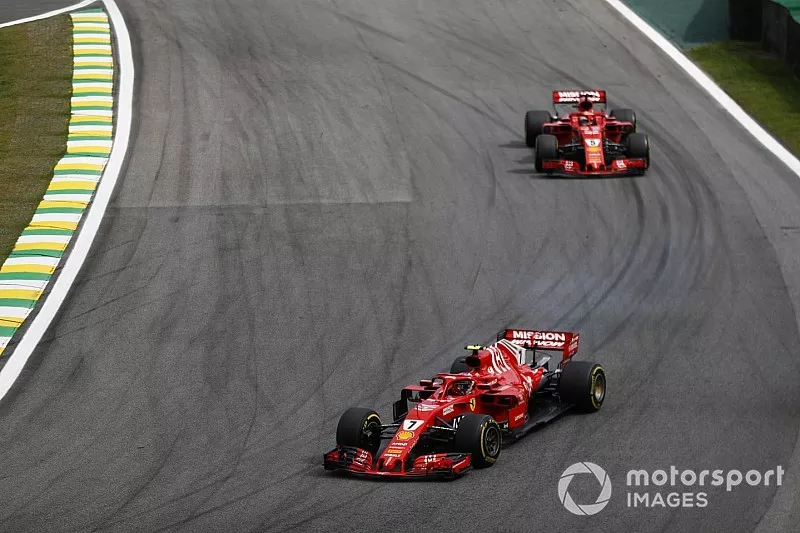 Kimi Raikkonen, Ferrari SF71H, leads Sebastian Vettel, Ferrari SF71H. 