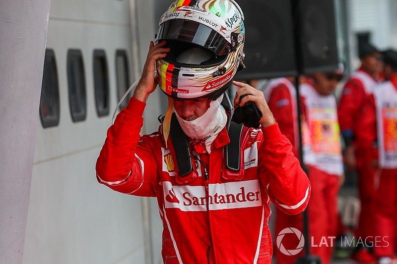 Sebastian Vettel, Ferrari, en el parque cerrado.