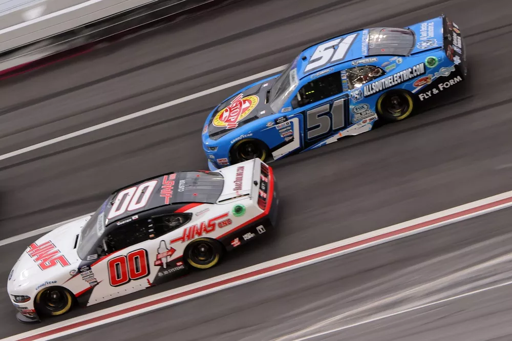 Cole Custer, Haas Factory Team; Jeremy Clements, JCR 