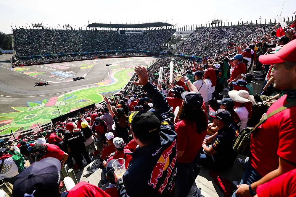 Fans cheer as Lewis Hamilton, Mercedes W12, Sergio Perez, Red Bull Racing RB16B