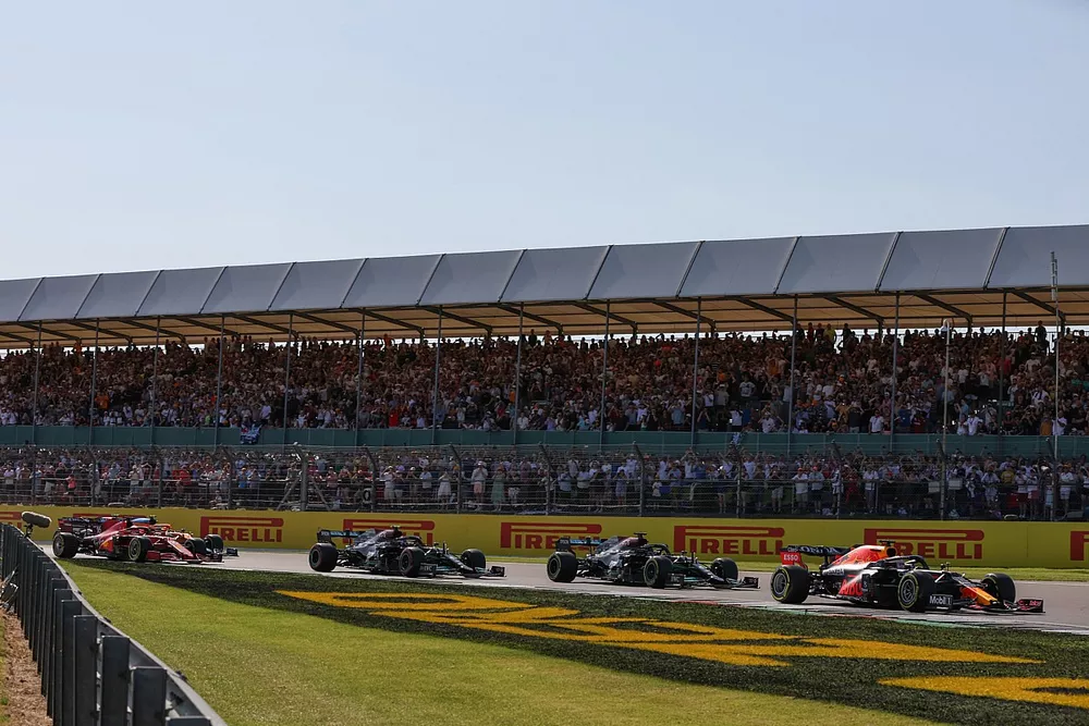 Max Verstappen, Red Bull Racing RB16B, Lewis Hamilton, Mercedes W12, Valtteri Bottas, Mercedes W12, and Charles Leclerc, Ferrari SF21