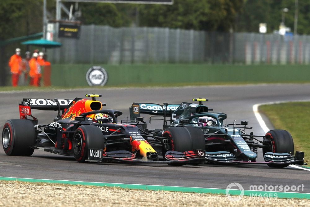 Sergio Perez, Red Bull Racing RB16B, battles with Sebastian Vettel, Aston Martin AMR21