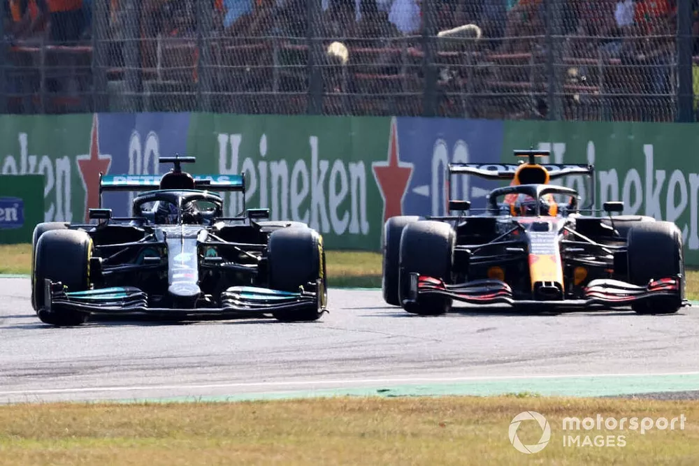 Lewis Hamilton, Mercedes W12, battles with Max Verstappen, Red Bull Racing RB16B