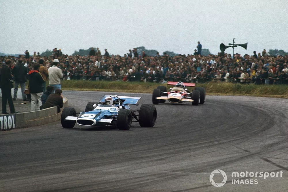 Jackie Stewart, Matra MS80 Ford, leads Jochen Rindt, Lotus 49B Ford
