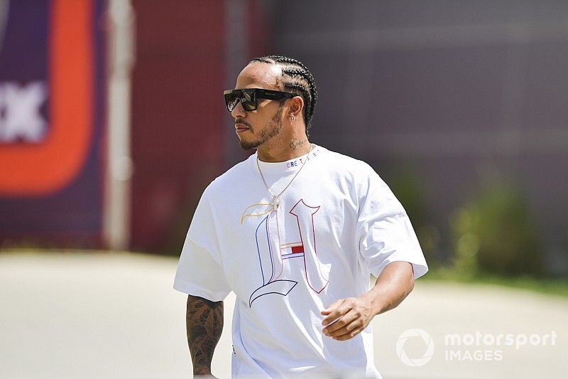 Lewis Hamilton, Mercedes AMG F1 arrives in the paddock