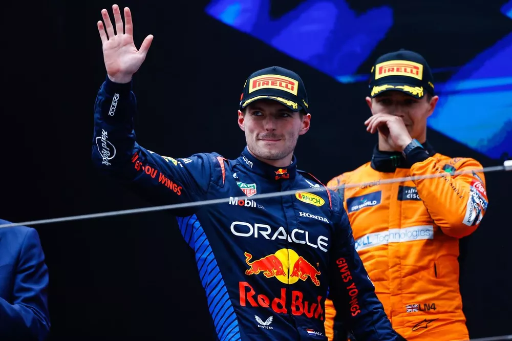 Max Verstappen, Red Bull Racing, 1st position, waves from the podium