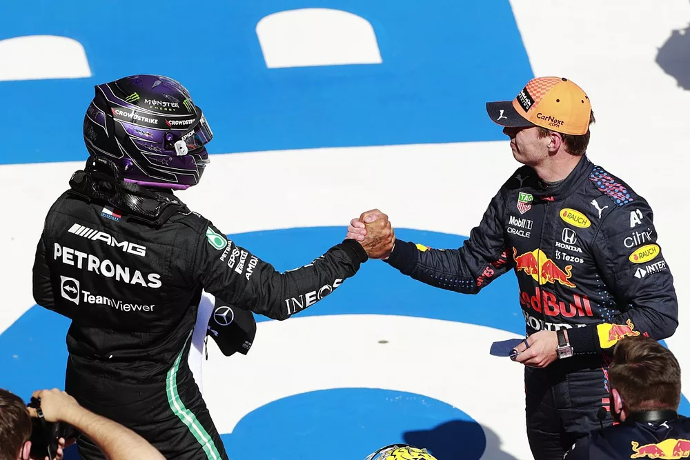 Lewis Hamilton, Mercedes, congratulates pole man Max Verstappen, Red Bull Racing, in Parc Ferme