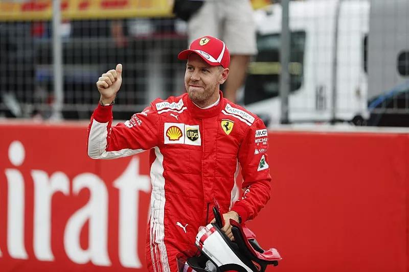 Sebastian Vettel, Ferrari, celebrates his pole position