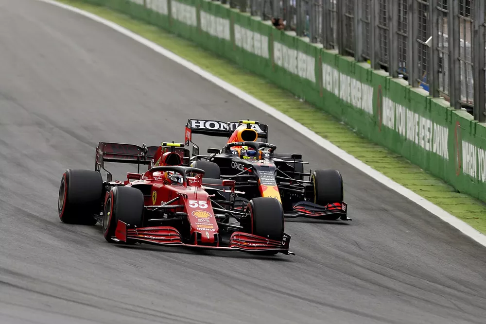 Carlos Sainz Jr., Ferrari SF21 , battles with Sergio Perez, Red Bull Racing RB16B