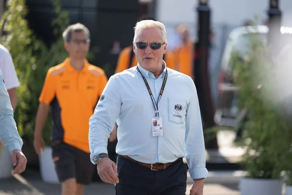 Johnny Herbert, former driver and FIA steward, arrives at the track 