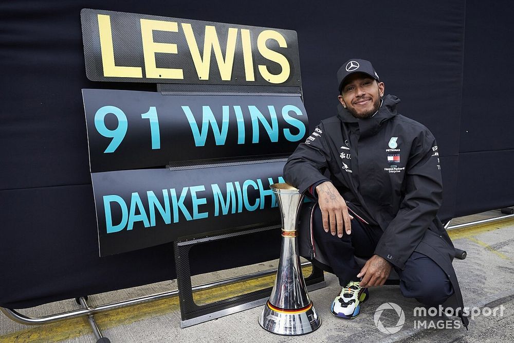 Lewis Hamilton, Mercedes-AMG F1, 1st position, celebrates after securing his 91st F1 race win, equalling the record of Michael Schumacher