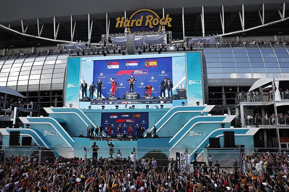 Charles Leclerc, Ferrari, 2nd position, Max Verstappen, Red Bull Racing, 1st position, Carlos Sainz, Ferrari, 3rd position, on the podium