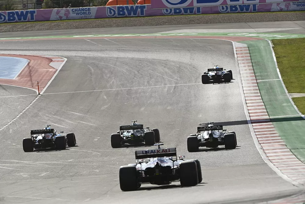 Esteban Ocon, Alpine A521, Sebastian Vettel, Aston Martin AMR21, Fernando Alonso, Alpine A521, Pierre Gasly, AlphaTauri AT02, and Nikita Mazepin, Haas VF-21
