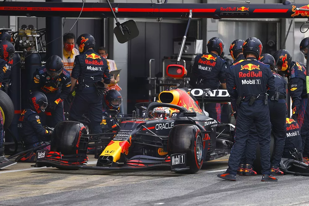 Max Verstappen, Red Bull Racing RB16B, leaves his pit box after a stop