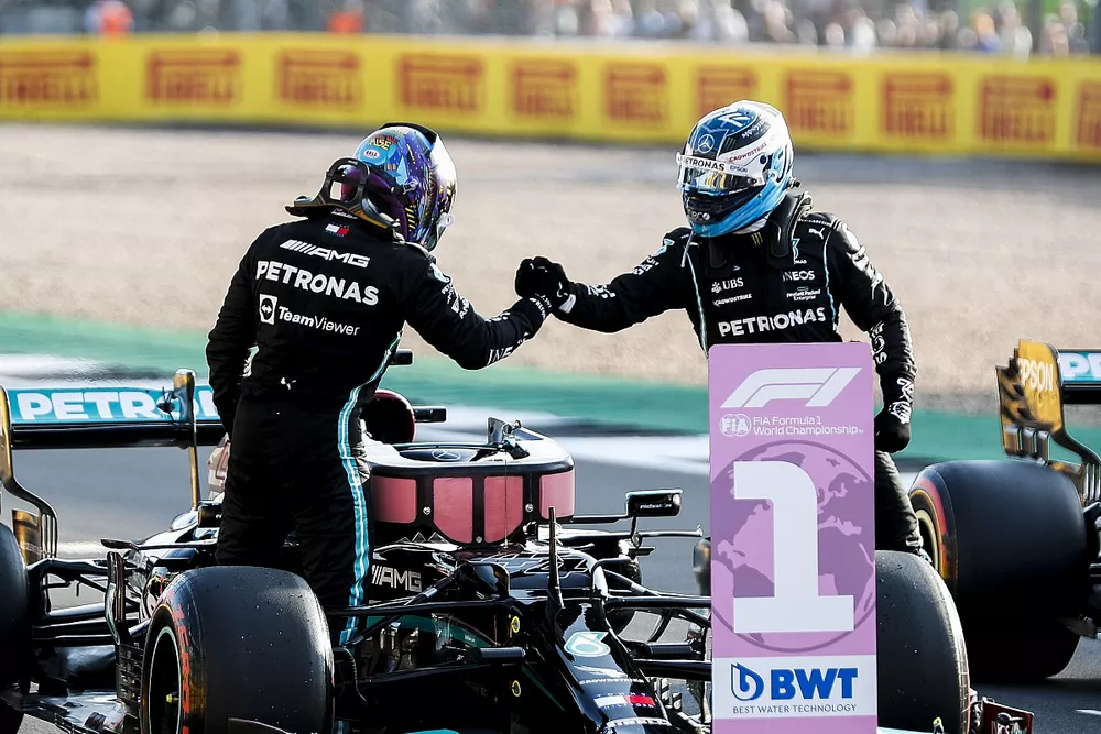Valtteri Bottas, Mercedes, congratulates Lewis Hamilton, Mercedes, on securing pole position

