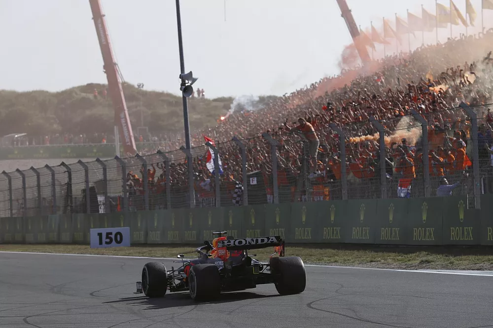 Max Verstappen, Red Bull Racing RB16B, 1st position, celebrates on his way to Parc Ferme