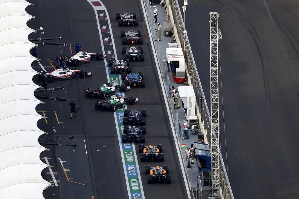 The queue to leave the pits