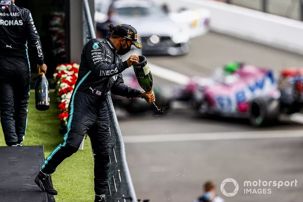 Race Winner Lewis Hamilton, Mercedes-AMG F1 celebrates on the podium with the champagne