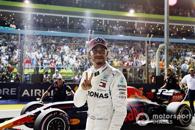 Lewis Hamilton, Mercedes AMG F1 W09 EQ Power+, celebrates after taking Pole Position