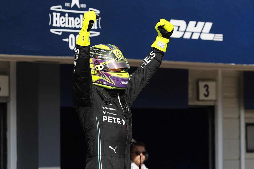 Pole man Lewis Hamilton, Mercedes-AMG, celebrates on arrival in Parc Ferme