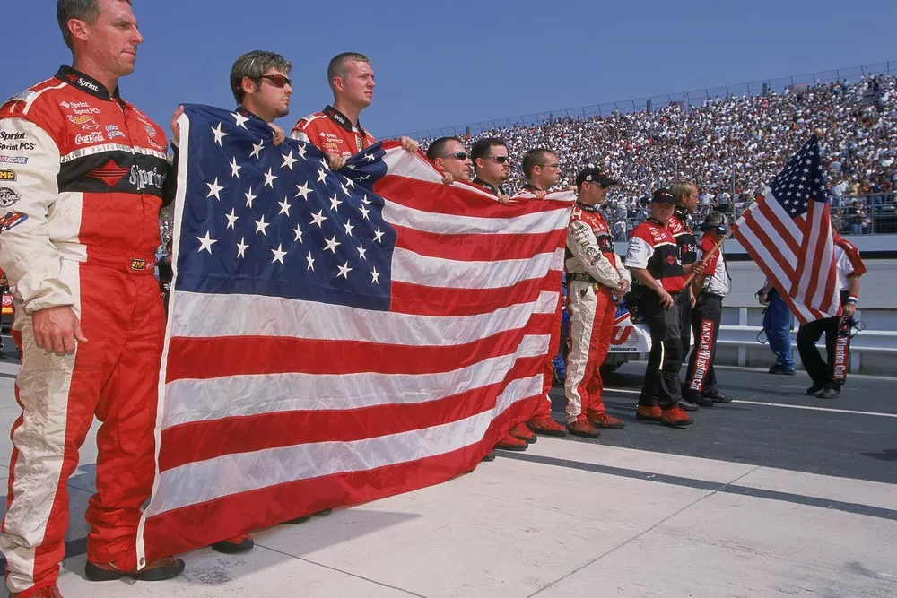 Kyle Petty's pit crew with American flags
