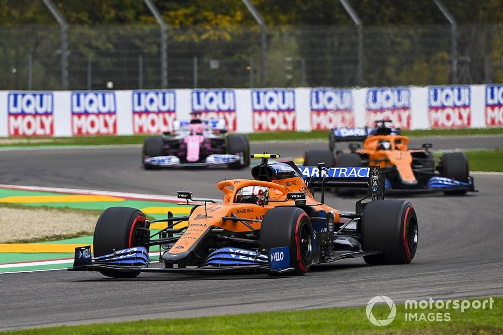 Lando Norris, McLaren MCL35, Carlos Sainz Jr., McLaren MCL35, and Sergio Perez, Racing Point RP20