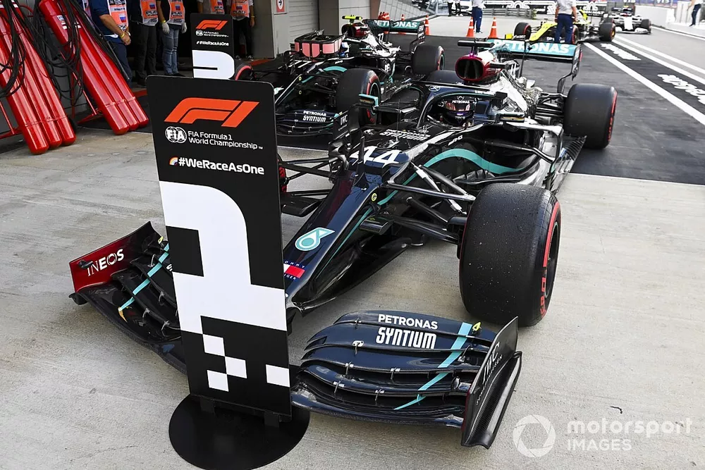 Pole Sitter Lewis Hamilton, Mercedes F1 W11 drives in to Parc Ferme