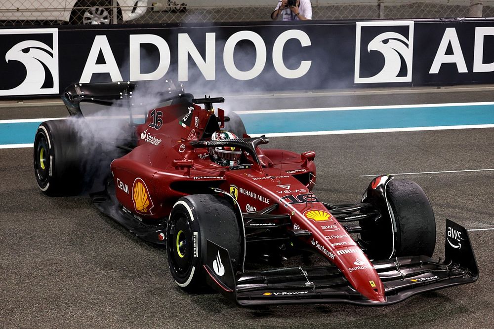 Charles Leclerc, Ferrari F1-75, 2nd position, performs donuts on the grid at the end of the race